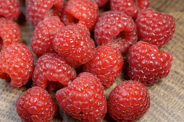 Fresh red raspberries close up. Raspberries macro shot.