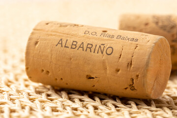 Wine cork, prominently displaying the words 'D.O. Rías Baixas Albariño,' indicating the wine's origin and type.