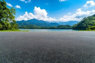 Asphalt road square and clear lake with green mountain