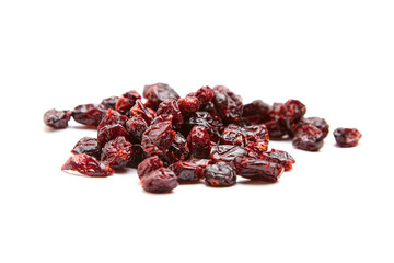 A small pile of dried cranberries with vibrant red hues and glossy, wrinkled textures, arranged on a white background. Perfect for snacks or cooking