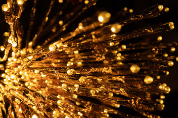 Naklejka premium close-up of illuminated golden string lights in a radial pattern, creating a festive and glowing holiday atmosphere, warmth, elegance