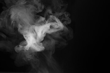 Abstract Smoke Swirls on Black Background