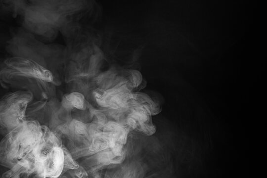 Abstract Smoke Swirls on Black Background