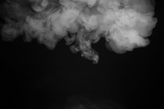 Abstract Smoke Swirls on Black Background