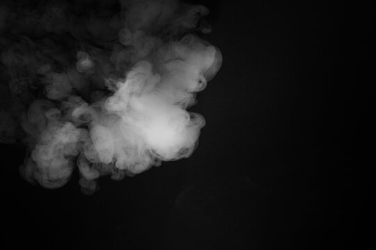 Abstract Smoke Swirls on Black Background