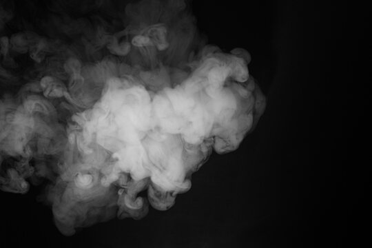 Abstract Smoke Swirls on Black Background