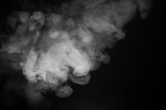 Abstract Smoke Swirls on Black Background