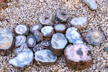 Round Agate Pieces with Glossy Surfaces on Irregular Pebbles
