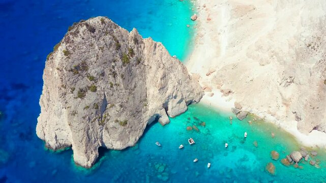 Island coast and beach with perfect tropical water in teal or turquoise blue in Greece. Akra Keri Zante. Mizithres Rock Island In Zakynthos Greek Video