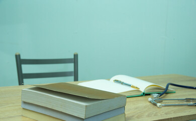 In a hospital setting, the presence of a doctor's physician book and stethoscope carries with it an air of professionalism and dedication to patient care.