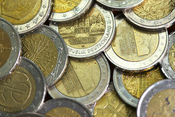 Euro coins. They are a direct cash payment instrument in most or some, depending on the type, EU countries.