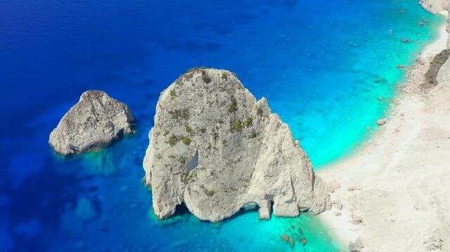 Zakynthos island cliffs in beautiful Ionian sea, Greece. Akra Keri rock in the blue sea in Zante. Aerial drone footage of sea coast with turquoise sea water on Greek island