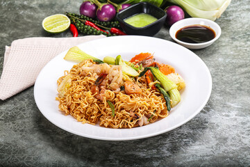 Asian cuisine - Fried noodles with seafood