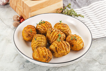 Baked baby potato with thyme