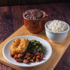 Bowl with feijoada and spices Typical Brazilian food