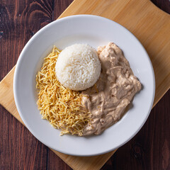 Chicken Stroganoff with Straw Potatoes Typical Brazilian Food