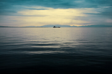 Tranquil Sunset Over Calm Ocean Waters