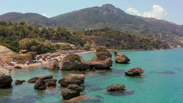 Aerial drone video from famous rocks in sandy beach of Porto Zoro, Zakynthos island, Ionian, Greece