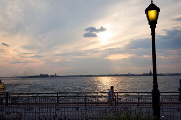 Sunset Walk by the Waterfront 