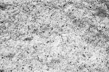 Empty grey rough stone wall with black spot for abstract  background and texture. beautiful patterns, space for work, banner, wallpaper close up.