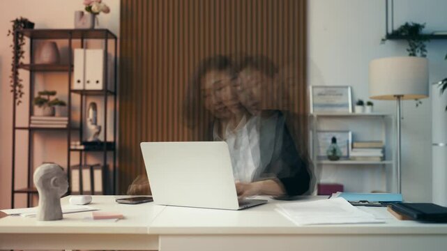 Businesswoman works long hours her office, struggling with personal life balance