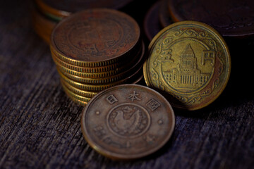 stack of old japanese coins. five yen coin showa era.