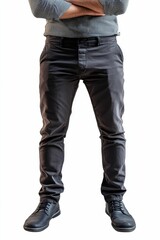 Dark trousers, shirt, shoes; arms crossed.