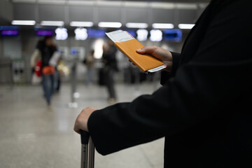 Portrait of Caucasian traveler woman hold ticket ready enjoy voyage tour passenger walk in airport...