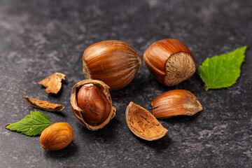 Hazelnuts on dark background