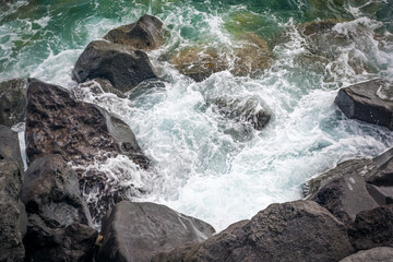 Detail of lava stone and sea water foam