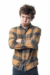 Fototapeta premium Displeased young man, arms crossed, plaid shirt.