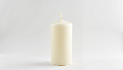 Isolated white pillar candle on light background
