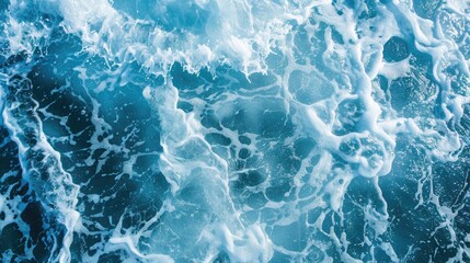 Fototapeta premium Abstract top view of sunlit blue water with splashes for graphic design.