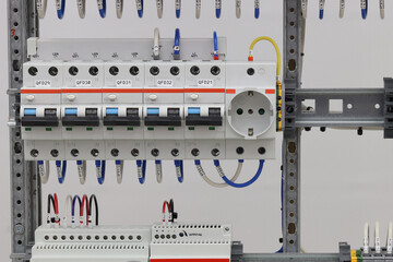 Automatic current switches to protect electrical loads. Soft focus.