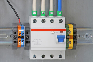 Automatic current switches to protect electrical loads. Soft focus.