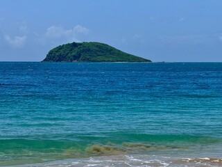 seascape of guadeloupe in the french west indies with view of the caribbean sea and a rocky islet
