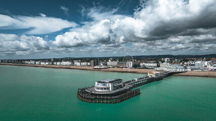 Aerial view of Worthing Pier and beach on a sunny cold day, West Sussex, UK