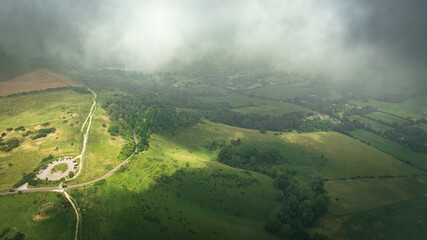 Aerial view of fields covered by clouds, close to Dichling Beacon by Brighton, East Sussex, UK