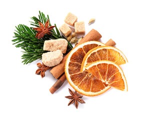 Different aromatic spices isolated on white, top view. Christmas season