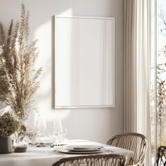 A white framed mirror is on a wall. The mirror is empty. A table with a vase of flowers and wine glasses is in front of the mirror