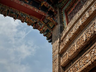 Looking up at Feihong Glazed Tower of Guangsheng Temple in Shanxi, showcasing its craftsmanship.