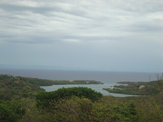 View from the mountains to a clear ocean water