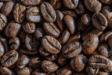 Roasted coffee beans close-up, can be used as a background