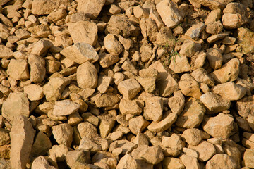 Loose irregular shapes yellow rocks