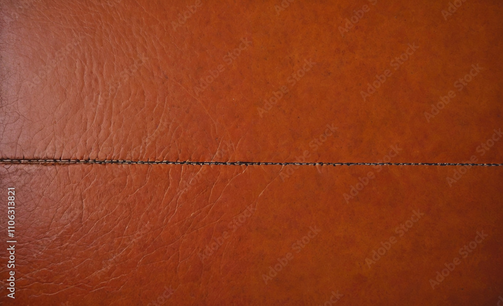 Poster Brown leather surface with a white line running down the middle. The line is about 1/4 of the way down the surface