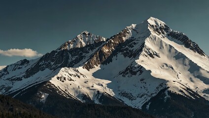 Obraz premium Majestic snow-capped mountain peak in the distance.