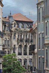 Obraz premium Old buildings with typical architecture from the lower city of Porto located in the north of Portugal