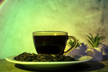 A hot cup of tea in a quiet, low-lit room.