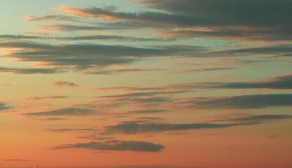 Colorful sky at sunset. Fabulous clouds. Colored background. Abstraction.