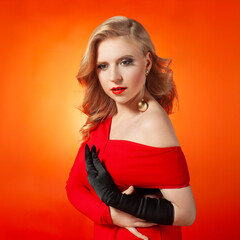 Glamorous Woman in Red Dress with Beauty Makeup